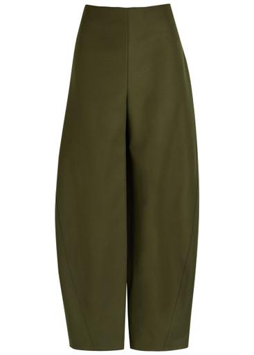 Twisted barrel-leg cotton trousers by ALAIA