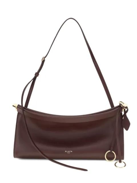 medium Le Click leather shoulder bag by ALAIA