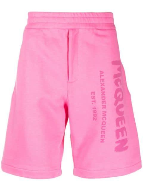 Graffiti-print track shorts by ALEXANDER MCQUEEN