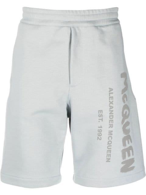 Graffiti-print track shorts by ALEXANDER MCQUEEN