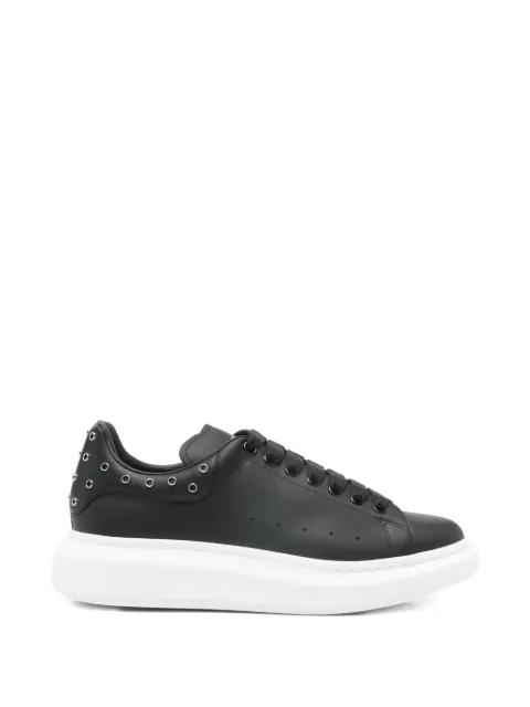 Oversized eyelet-detail sneakers by ALEXANDER MCQUEEN