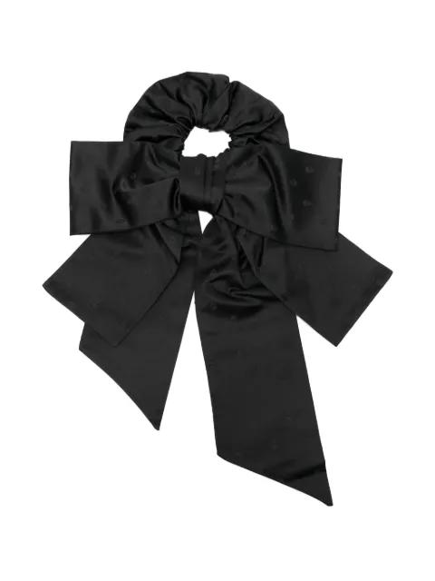 bow skull hair accessory by ALEXANDER MCQUEEN