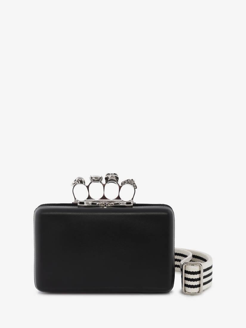 the knuckle twisted clutch in black by ALEXANDER MCQUEEN
