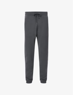 Raven logo-embroidered cuffed cotton-jersey jogging bottoms by ALLSAINTS