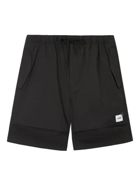layered side-pocket shorts by ALPHA INDUSTRIES