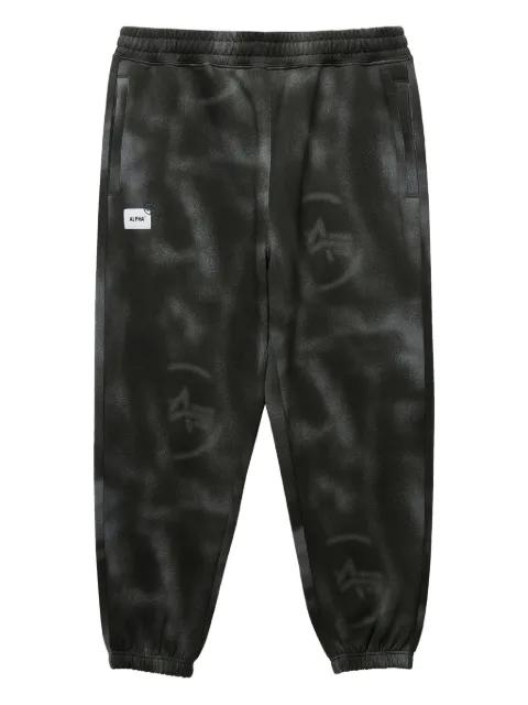 tie-dye logo track pants by ALPHA INDUSTRIES
