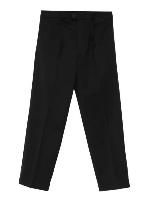 pleated-front trousers by AMARANTO