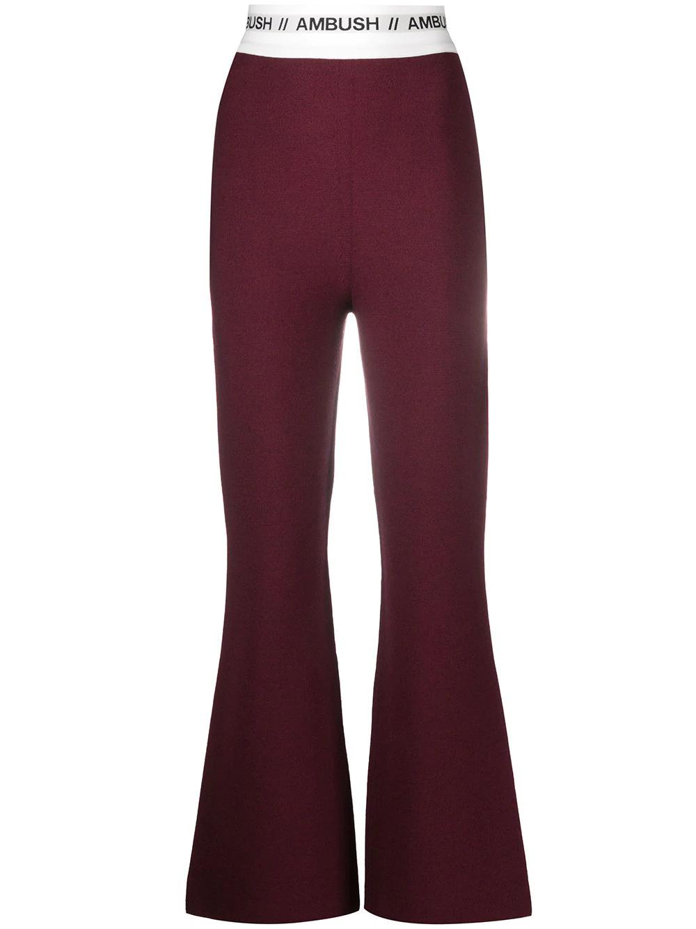 knitted logo stripe flared trousers by AMBUSH