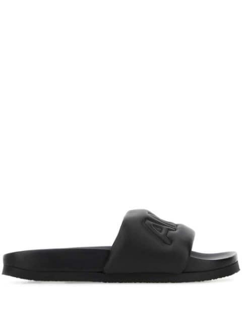 logo-embossed leather slippers by AMBUSH