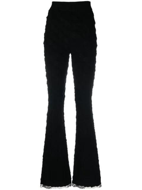 monogram flared trousers by AMBUSH