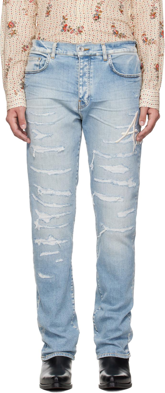 Blue 'AMIRI' Repaired Slim Jeans by AMIRI