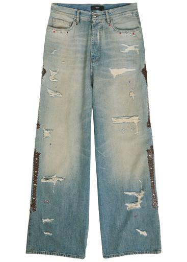 Bones Studded distressed relaxed jeans by AMIRI
