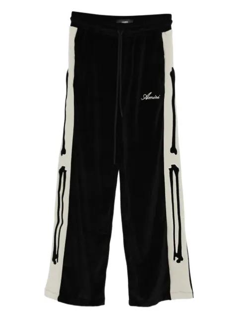 Bones track pants by AMIRI