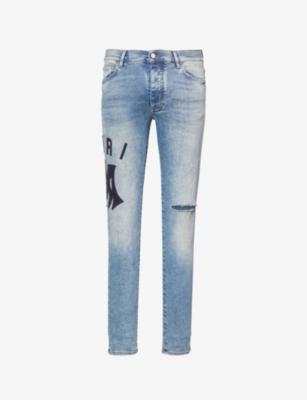 Brand-patch skinny-leg denim jeans by AMIRI