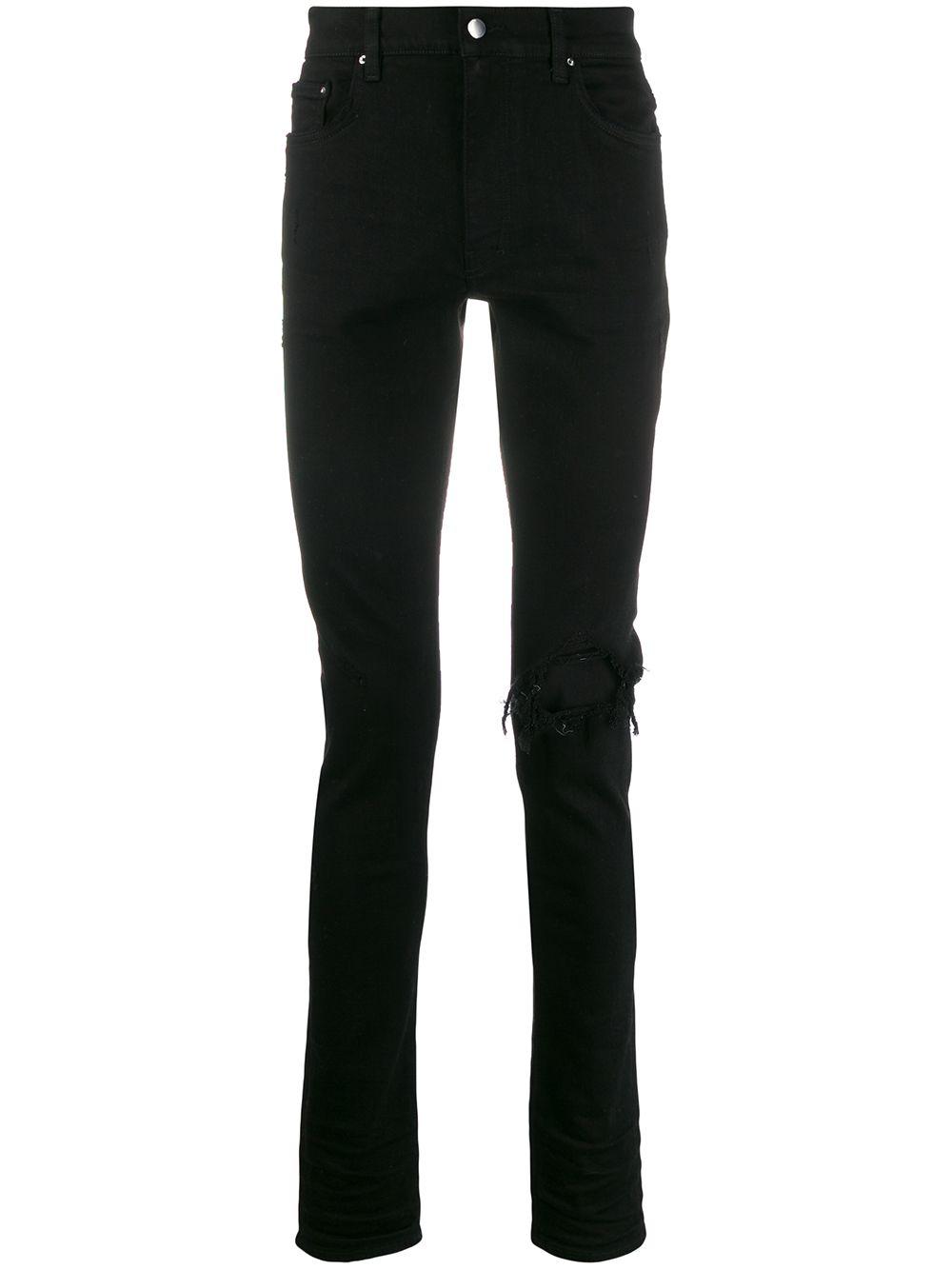 Broken skinny jeans by AMIRI