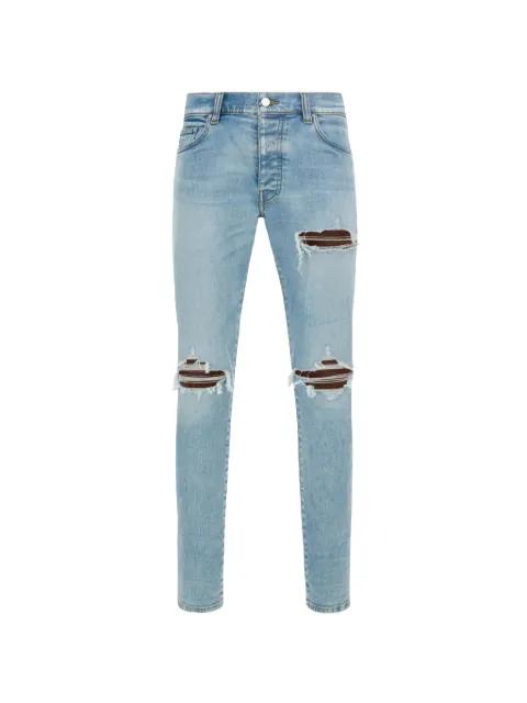 Croc Mx1 ripped-design jeans by AMIRI