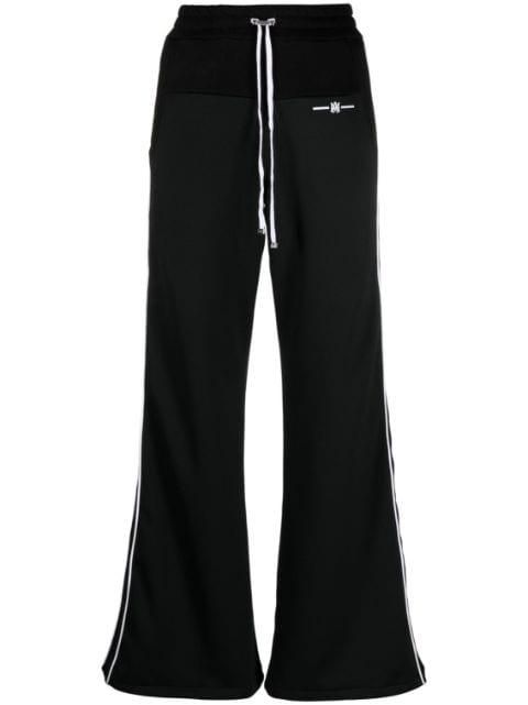 Hybrid track pants by AMIRI
