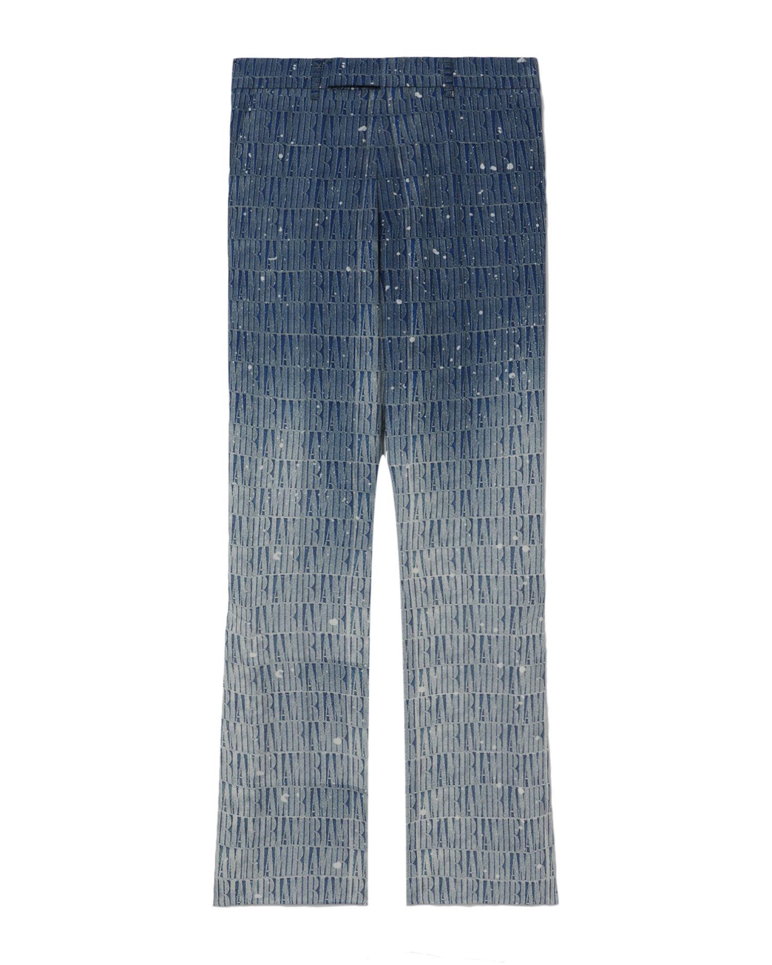 Logo gradient kick flare pants by AMIRI