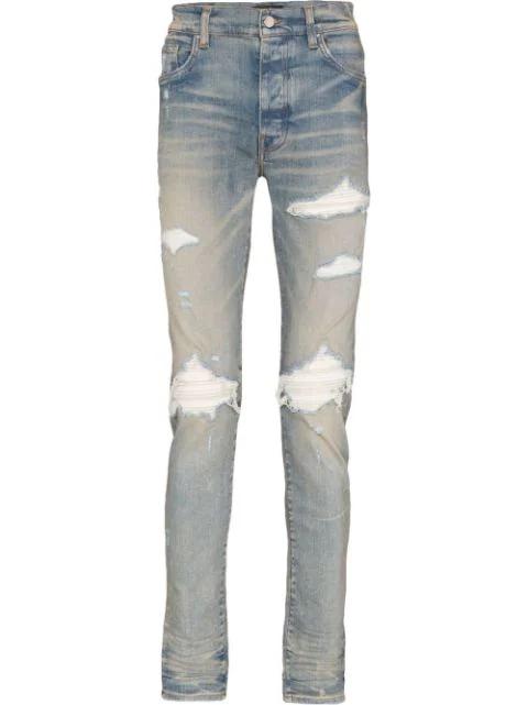 MX1 Ultra suede-patches skinny jeans by AMIRI