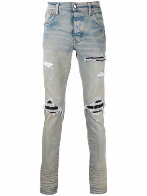 MX1 distressed-effect skinny jeans by AMIRI