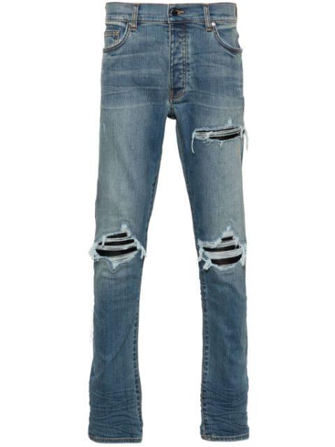 MX1 distressed-effect skinny jeans by AMIRI