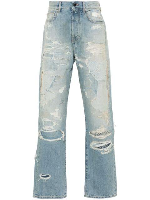 Repaired straight-leg jeans by AMIRI