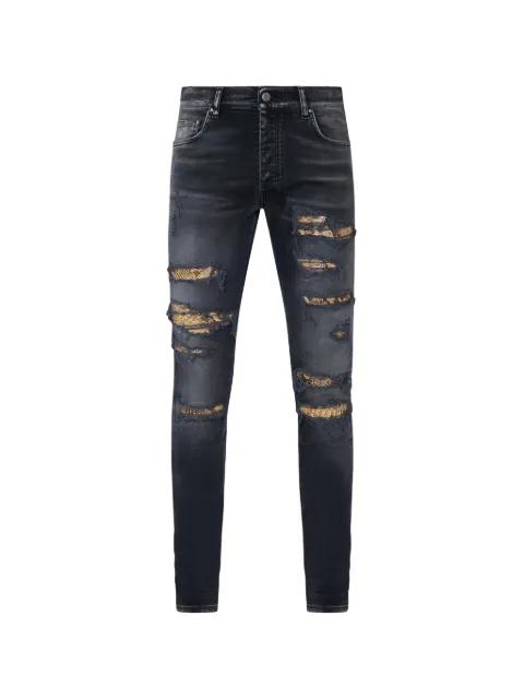 Snake Thrasher denim skinny jeans by AMIRI