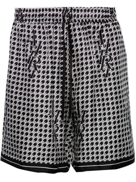Staggard printed silk shorts by AMIRI