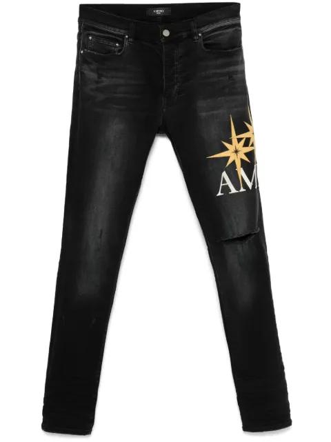 Starburst-appliqué jeans by AMIRI