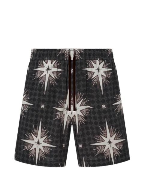 Starburst print shorts by AMIRI