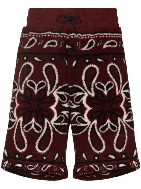 bandana print fleece track shorts by AMIRI