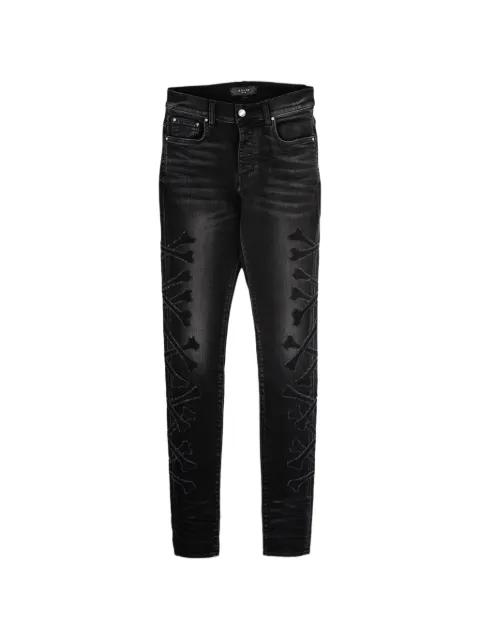 bones-detail jeans by AMIRI