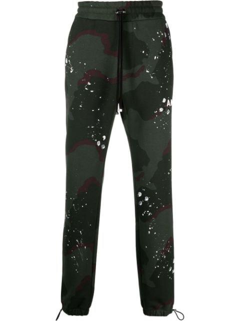 camouflage-print track pants by AMIRI
