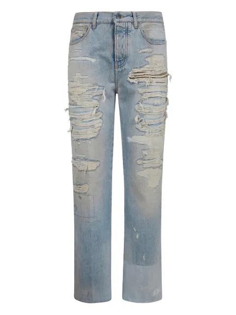 distressed-effect denim jeans by AMIRI