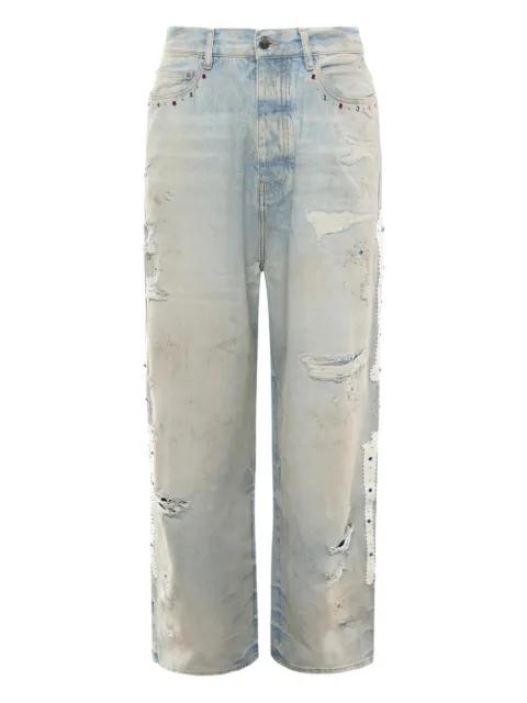 distressed embellished jeans by AMIRI