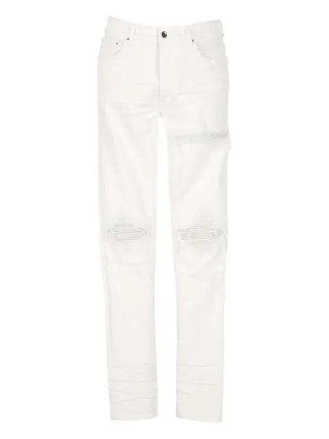 distressed jeans by AMIRI