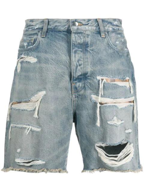 distressed knee-length denim shorts by AMIRI