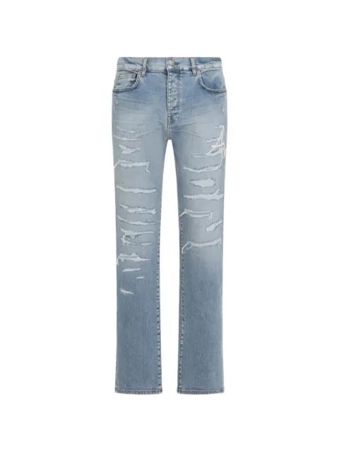 distressed signature jeans by AMIRI
