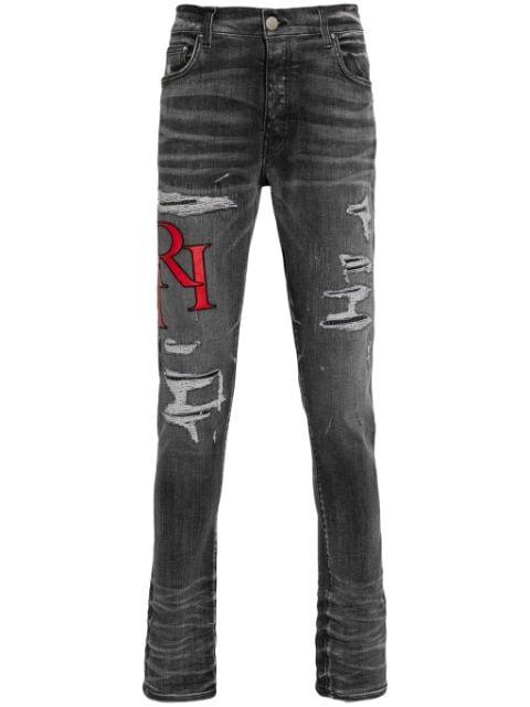 distressed skinny jeans by AMIRI