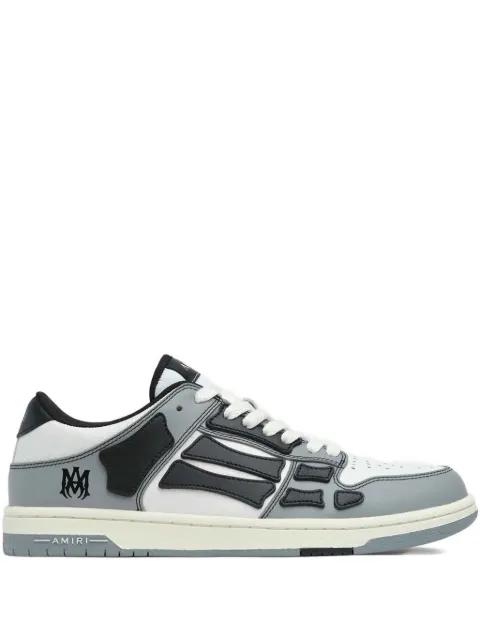 embossed skull leather sneakers by AMIRI