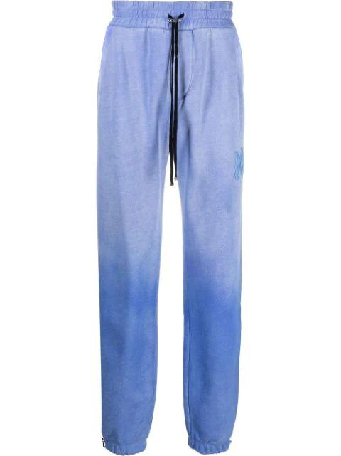 faded jersey track pants by AMIRI