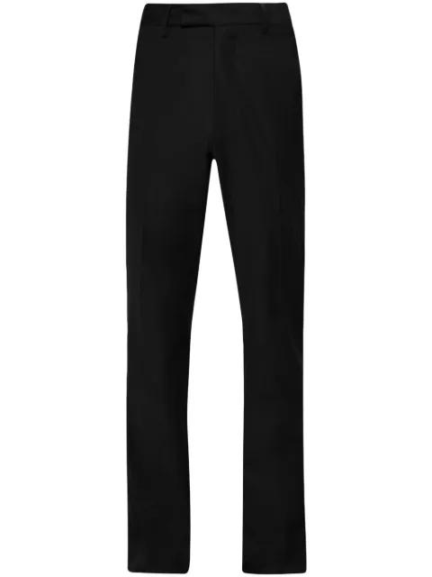 flared trousers by AMIRI