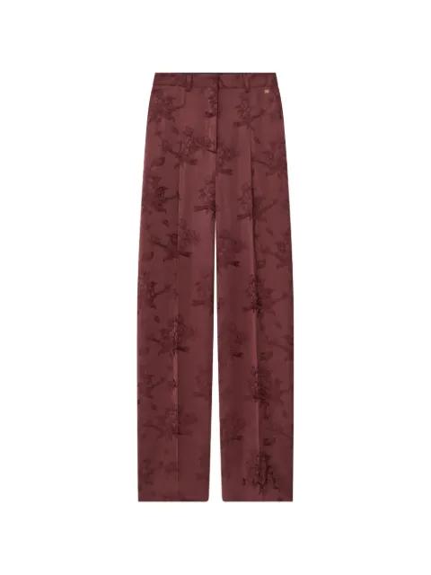 floral pleated trousers by AMIRI