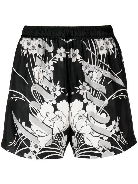 floral-print silk track shorts by AMIRI