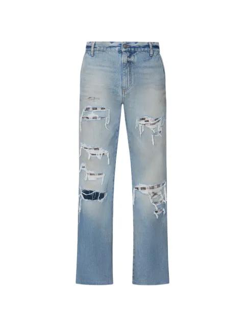 frayed-detail bootcut jeans by AMIRI