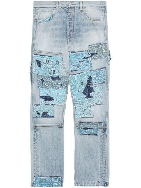 high-rise patchwork-detail jeans by AMIRI