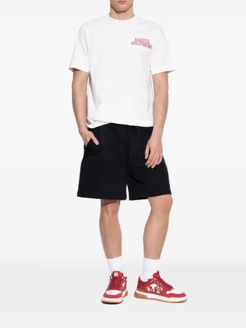 lace-up logo sneakers by AMIRI