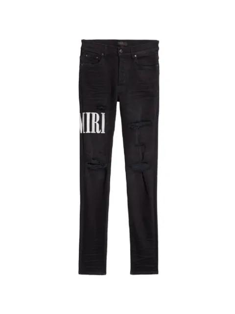 logo distressed jeans by AMIRI