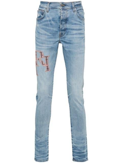 logo-embroidered skinny jeans by AMIRI
