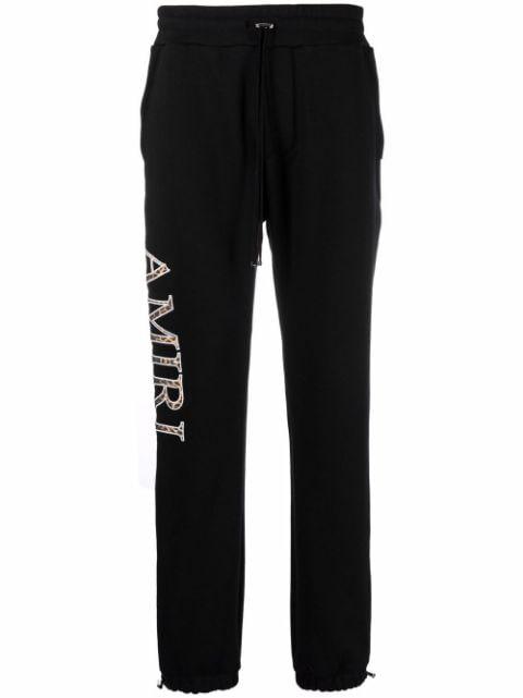 logo print track pants by AMIRI
